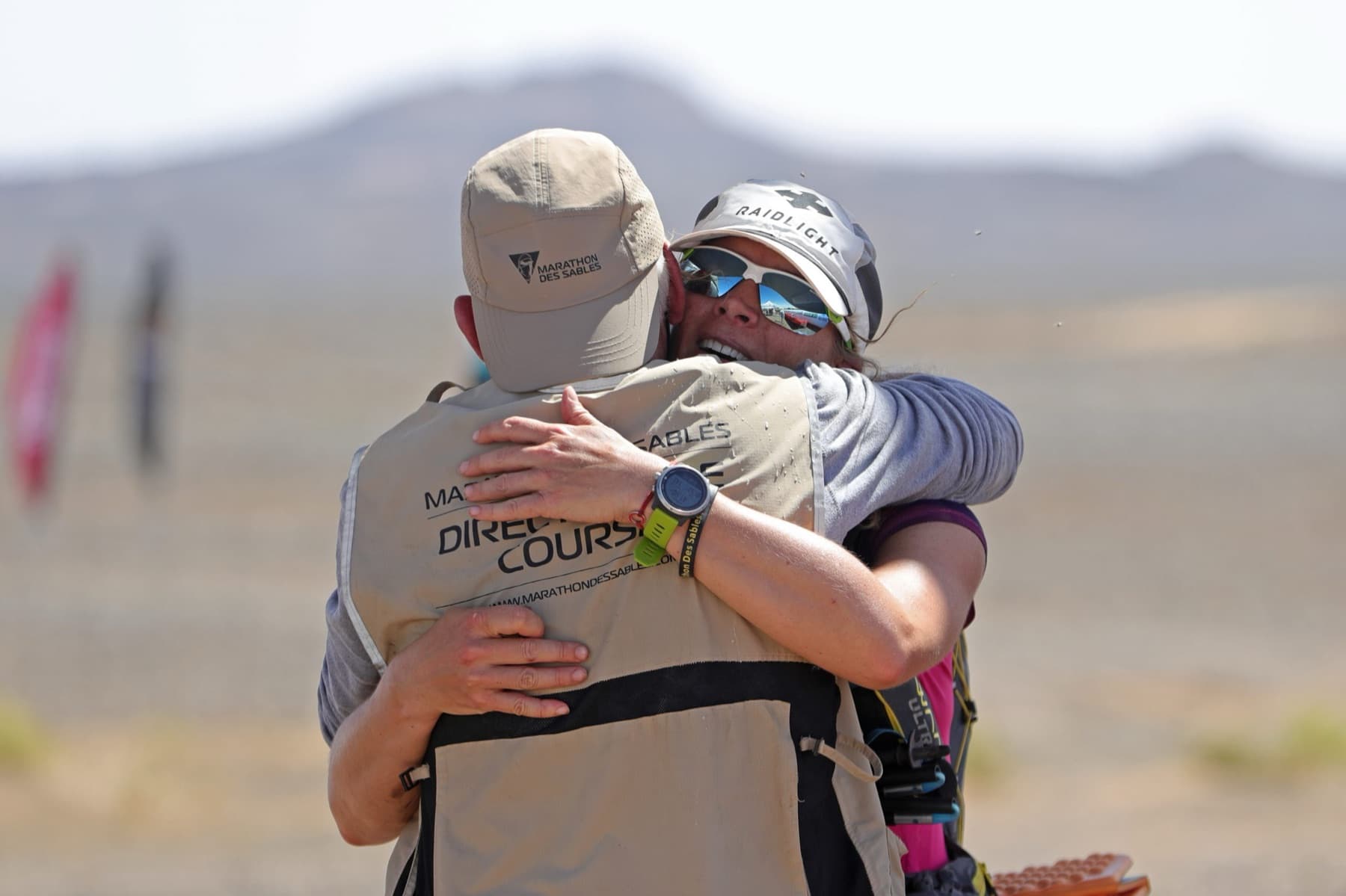 Charlotte hugging race director Patrick at the Marathon des Sables finish