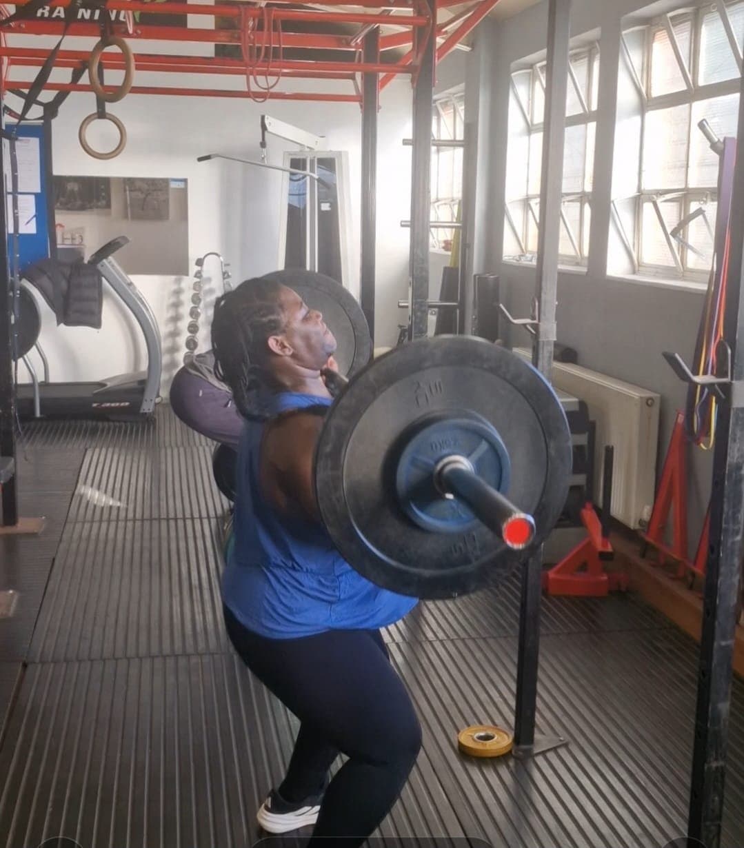 Barbell press in a Ladies That Lift session